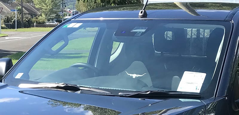 Windscreen protection treatment being applied